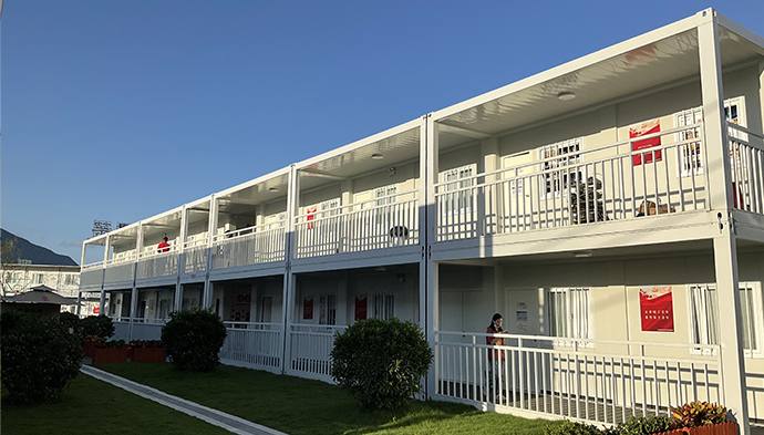 Contenedor de paquete plano